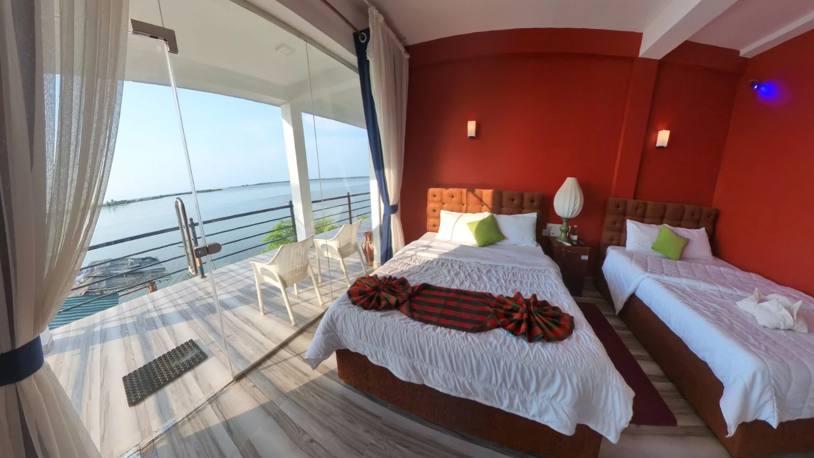 Bedroom with balcony and garden view