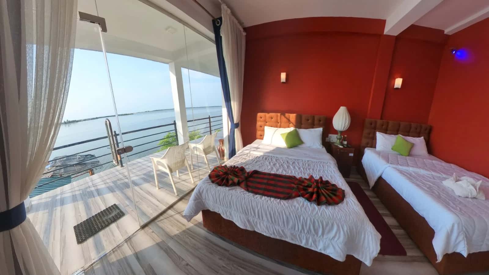 Bedroom with balcony and garden view